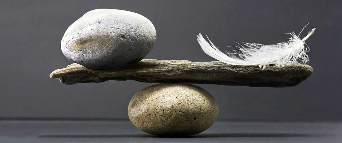 feather and stone balance